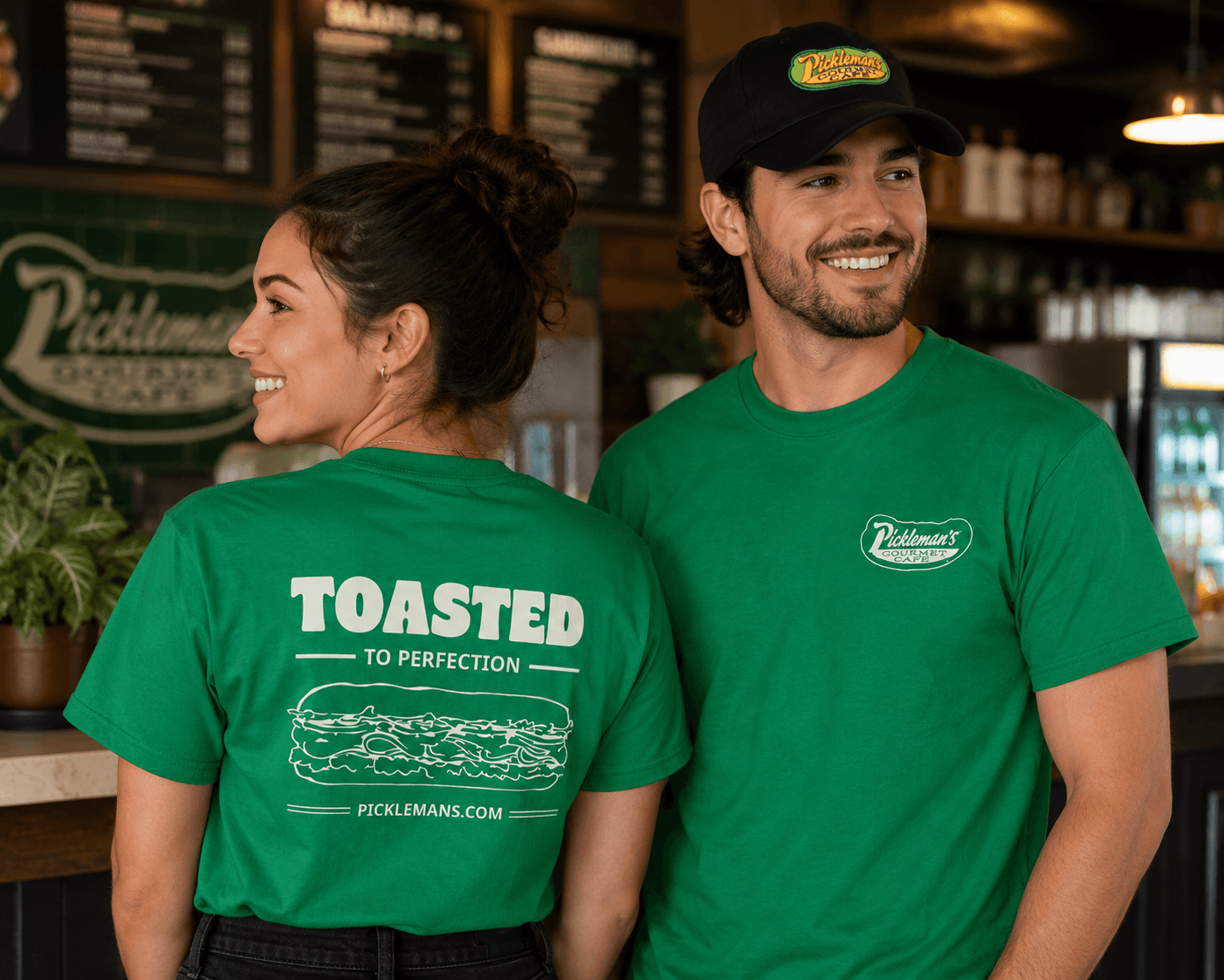 Pickleman's staff wearing custom branded green tees and cap